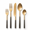 Bronte 5-piece cutlery set with matte gold heads and dark burnished handles, laid out in a row.