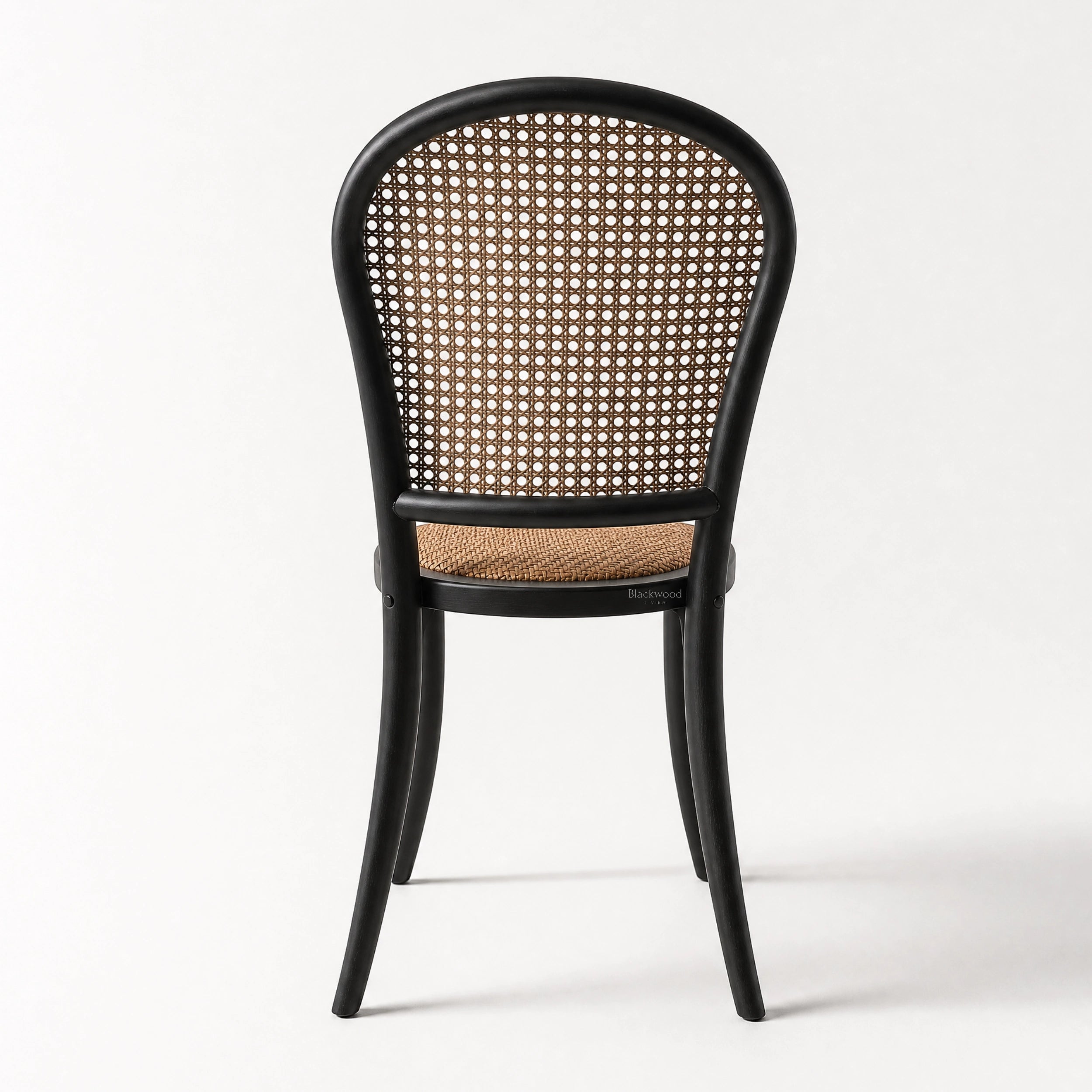 Langford Oak Bistro Chair with hand-finished rattan back and cushioned woven seat