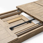 Marlborough Extension Dining Table in solid mango wood with an aged finish and visible gear-driven extension mechanism