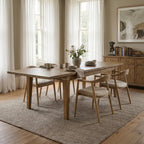 Marlborough Extension Dining Table in solid mango wood with a softly aged finish, set in a warm farmhouse dining room.