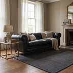 Ashcroft Sofa - Three Seat in South American top-grain cow leather, Chesterfield with brass studs and rolled arms.