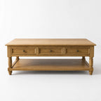 Somerset Oak Coffee Table with three drawers, turned legs, and warm natural oak finish.