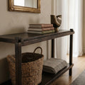 Millhouse Console in Antique Walnut solid fir, farmhouse-style entryway table with books and a metal vase.
