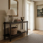 Millhouse Console in solid fir with Antique Walnut finish, shown with lamp, books, mirror in farmhouse entryway