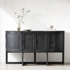 Ravenswood Hall Table in reclaimed oak with a dark finish, featuring curved ends and architectural lines.