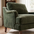 Ashcroft 1.5-seat chair in olive polyester velvet with a deep, cushioned seat and wooden legs.