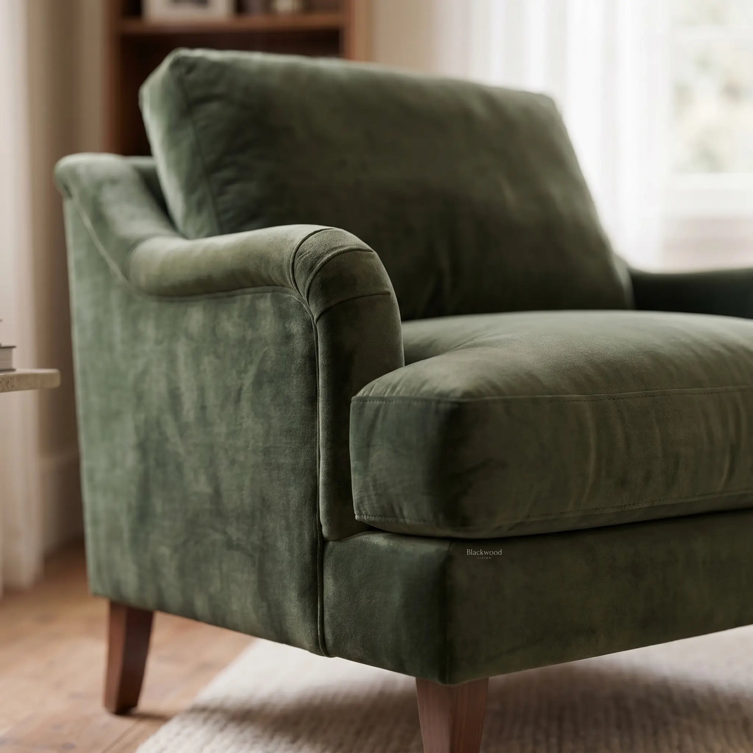 Ashcroft 1.5-seat chair in olive polyester velvet with a deep, cushioned seat and wooden legs.
