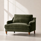 Olive polyester velvet Ashcroft 1.5-seat chair with deep cushion and wooden legs.