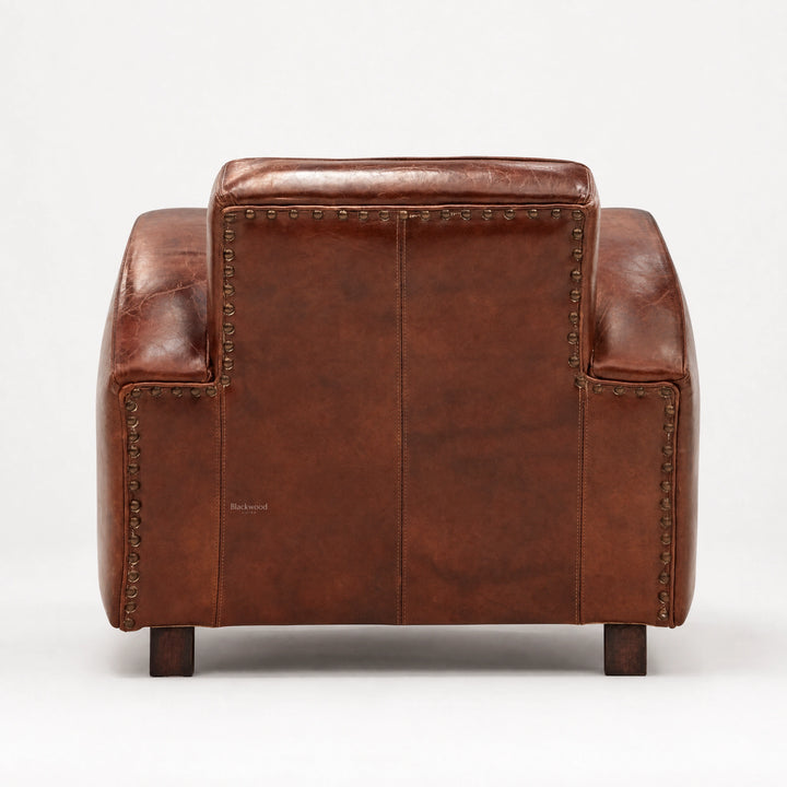 Back of Kingsford Leather Armchair in Vintage Tobacco South American top-grain cow leather with studded nailhead trim.
