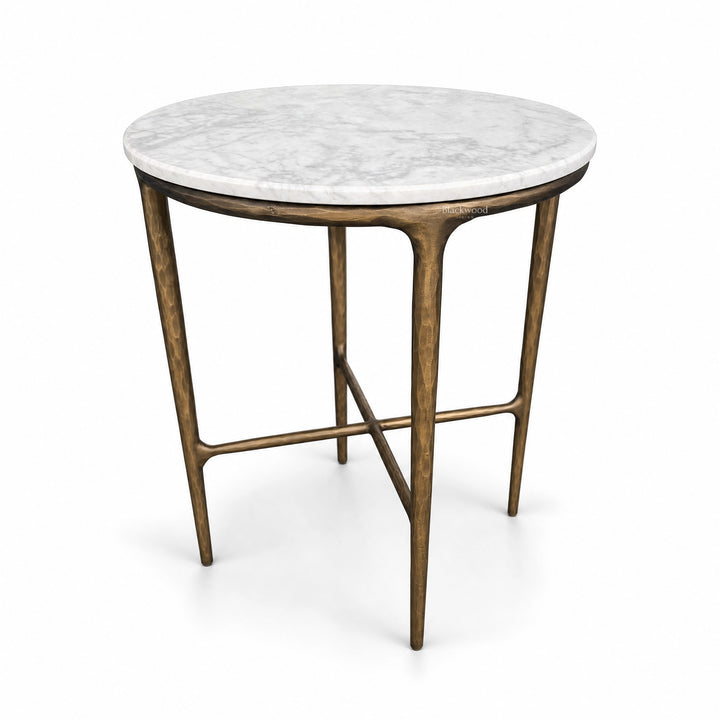 Montclair Marble Side Table with a round white marble top and sculptural bronze iron base.