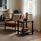 Millhouse Side Table in a warm living room, solid fir wood with exposed joinery, complemented by decor.