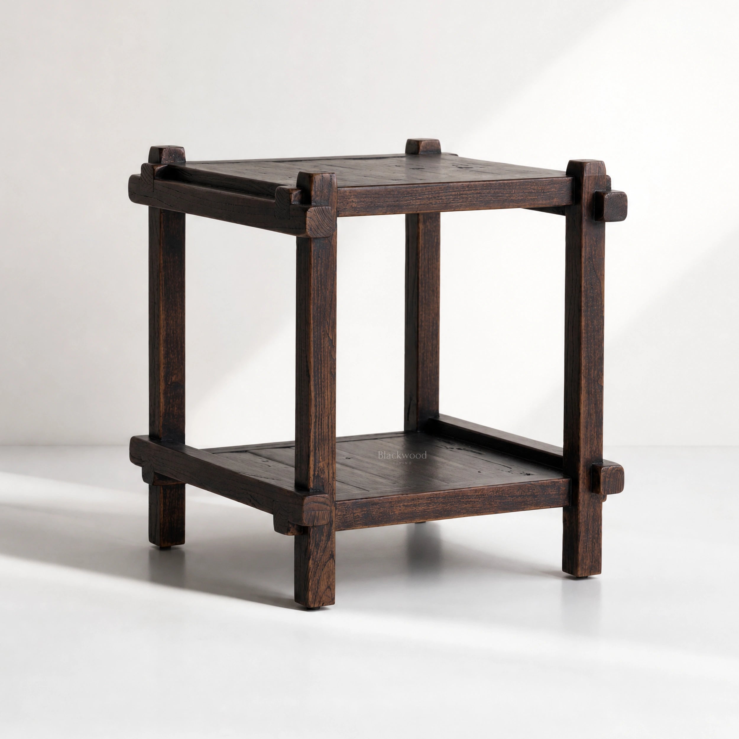 Millhouse Side Table in dark fir with exposed joinery detailing and warm texture.
