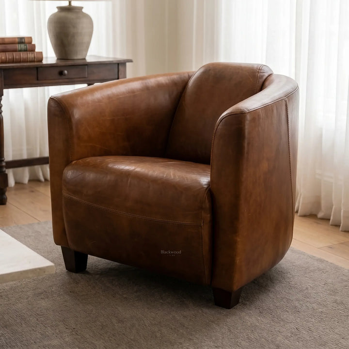 Dalton Club Chair in South American top-grain cow leather with a solid rubber wood frame; anchors a room with timeless comfort.