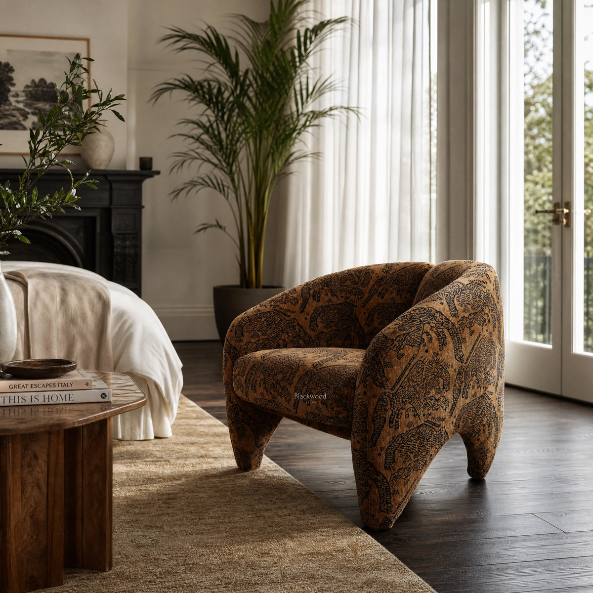Tsavo Chair in textured chenille with wildlife-inspired pattern, safari-lodge style for a refined living room.