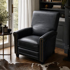 Chatsworth Leather Recliner - Estate Black in a cozy room with window, side table, and dark bookcase.