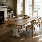 Eastport Dining Table crafted from reclaimed boat wood in a sunlit coastal dining room with warm, textured timber.