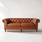 Ashcroft 3 Seat Sofa - Vintage Tan in top-grain cow leather with deep buttoned Chesterfield tufting, rolled arms, brass studs.
