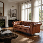 Ashcroft 3 Seat Sofa in Vintage Tan leather with deep buttoned Chesterfield, brass studs, and rolled arms.
