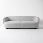 Amani Sofa in light grey textured fabric with softly curved arms and generous seating.