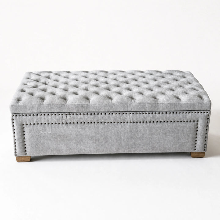 Charlotte Linen Chest: grey linen tufted storage chest with nailhead trim and wooden feet.