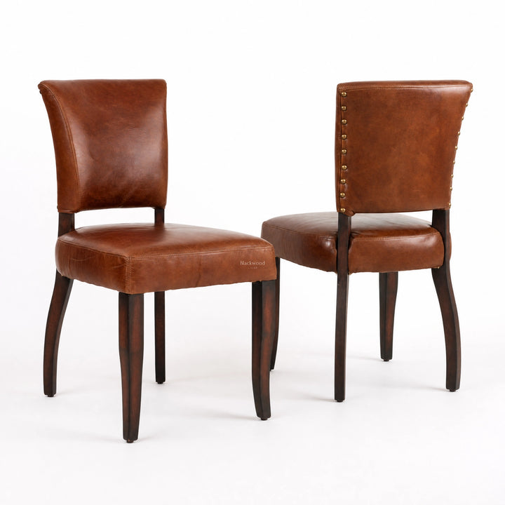 Pair of Beaumont Dining Chairs in vintage tobacco leather with brass nailhead trim