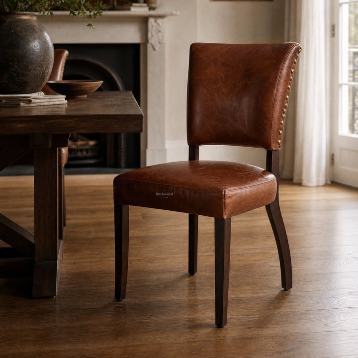 Beaumont Dining Chair - Vintage Tobacco in top-grain South American leather with nailhead trim.