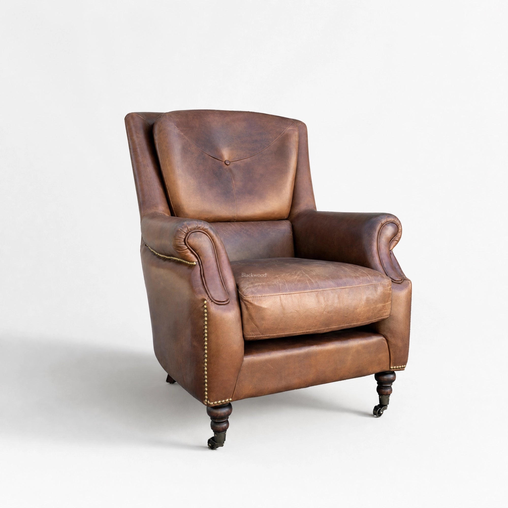 Beaumont Armchair in hand-finished top-grain leather, vintage tobacco color with rolled arms and nailhead trim.