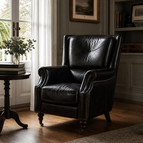 Beaumont Armchair Estate Black in a refined study, hand-finished South American leather with nail trim.
