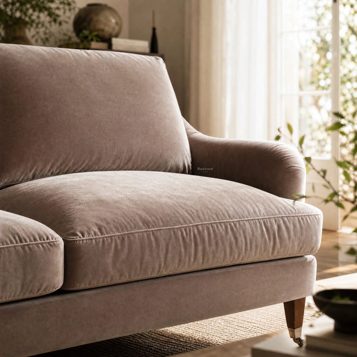 Permbroke Sofa Moonstone in soft velvet polyester with deep cushions, shown in a bright living room.