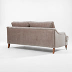 Permbroke Sofa Moonstone velvet with deep cushions, curved arms and wooden legs.