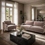 Pembroke 1.5-seat chair in Moonstone velvet, plush sunlit living room with elegant neutral decor.