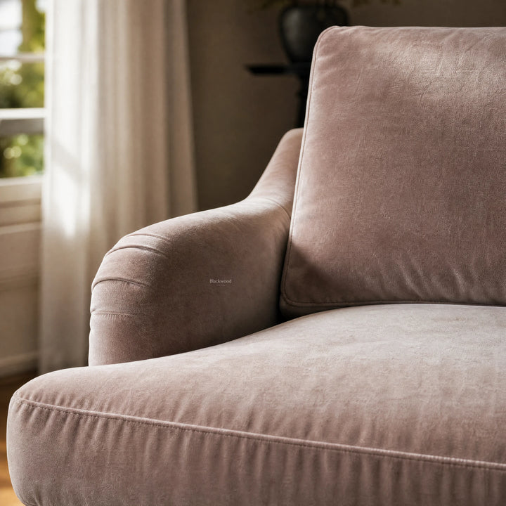 Moonstone Pembroke Chair close-up of plush velvet upholstery on arm and backrest.