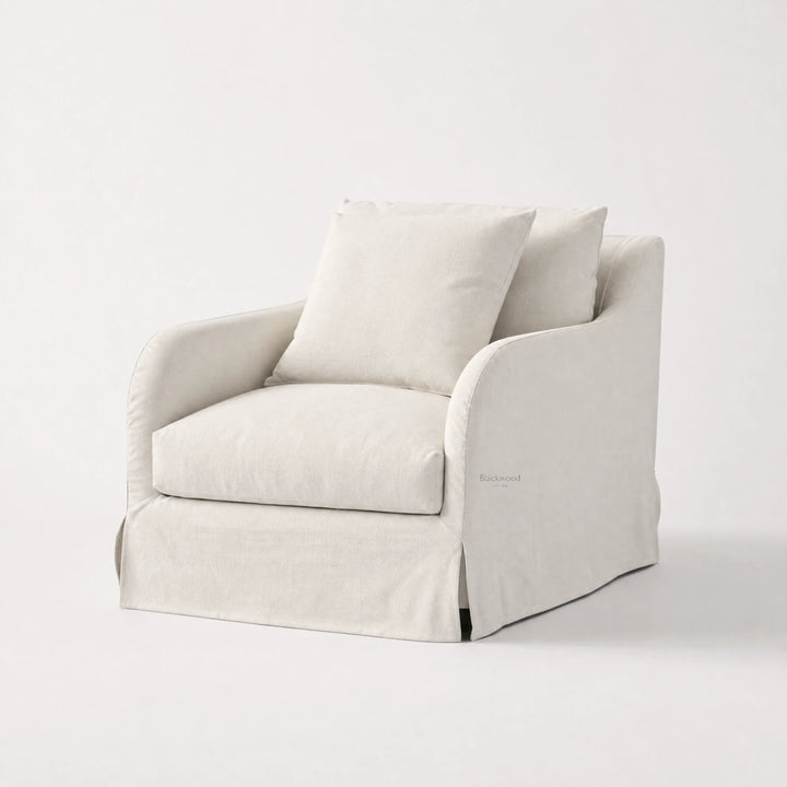 Kingston Occasional Chair in natural linen-cotton slipcover with cushioned arms.