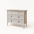 Laguna Dresser in soft antique finish with woven rattan panels, mahogany and white cedar, bamboo-inspired frame.