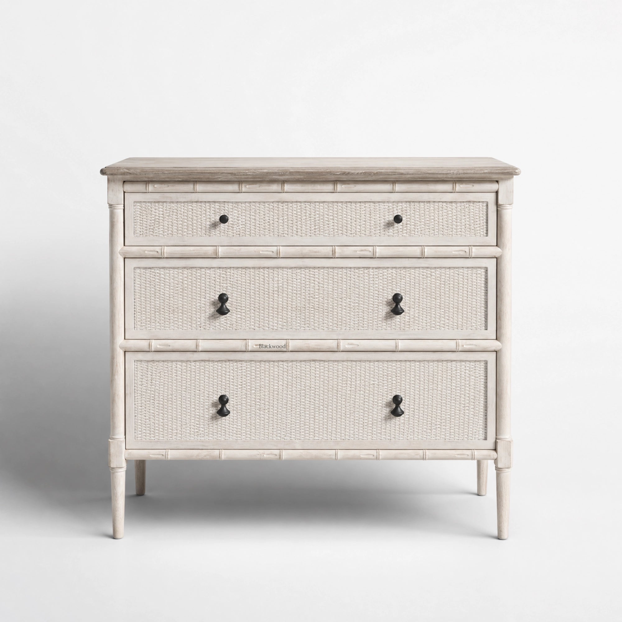 Laguna Dresser with soft antique finish, pale wood, handwoven rattan panels and bamboo-inspired framing.