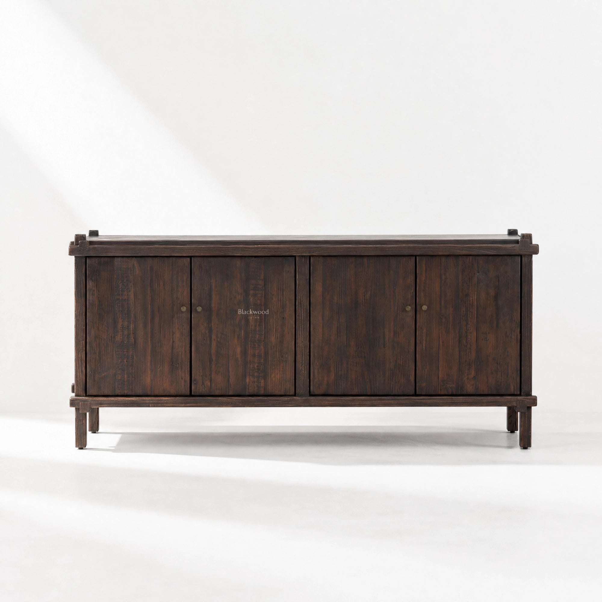 Millhouse Sideboard in solid fir with dark finish, simple, sturdy design and brass knobs.