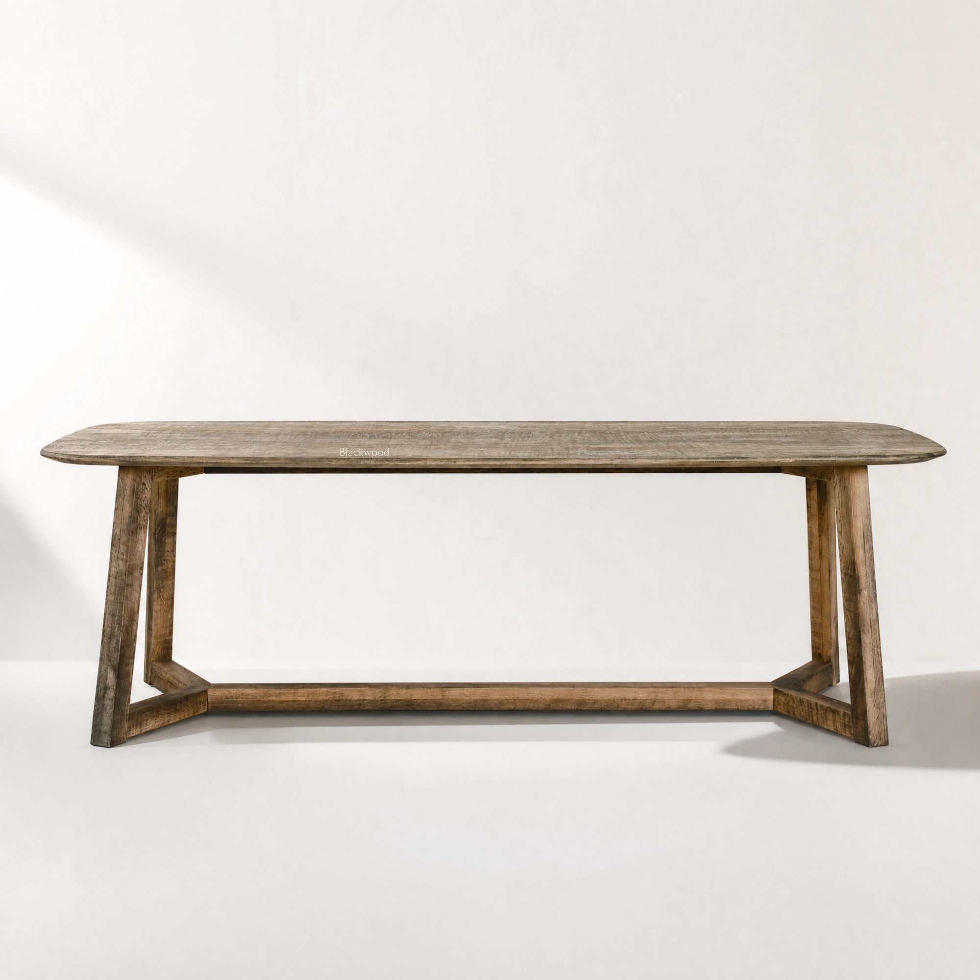 Pure Hawaii Dining Table in reclaimed oak with a weathered finish, solid timber construction and rounded corners.