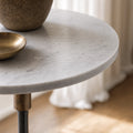 Mayfair Marble Side Table with crisp white marble top and slender black iron pedestal.