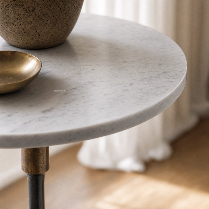 Mayfair Marble Side Table with crisp white marble top and slender black iron pedestal.