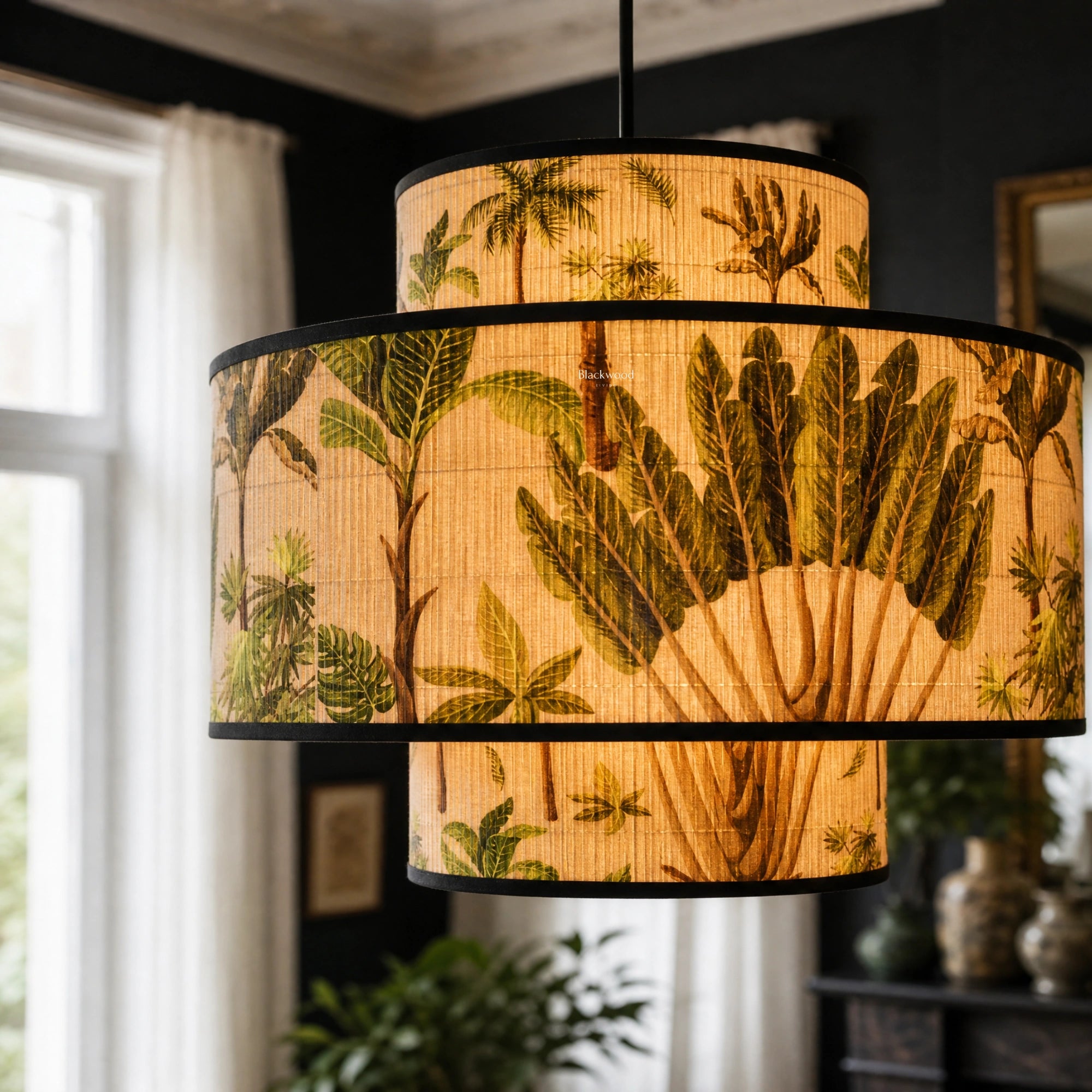 Belize Lightshade pendant with bamboo surface and tropical palm leaves, warm inviting glow.