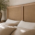 Willow Headboard with Bayur wood frame and woven natural rattan panels in a neutral bedroom.