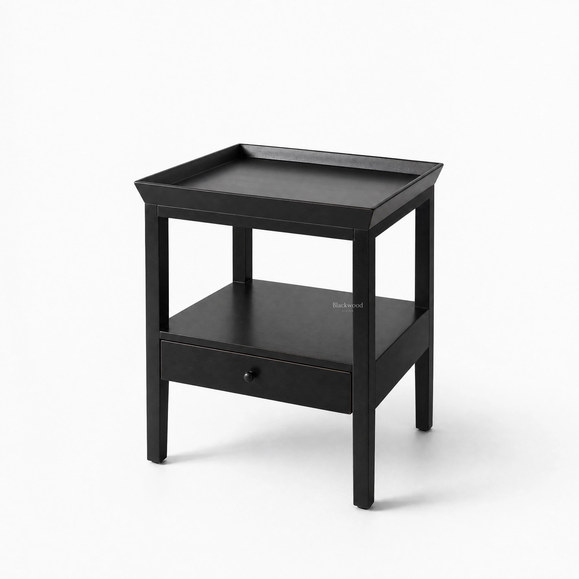 Colombo Bedside Table in black alder with tray top, open middle shelf, and bottom drawer.