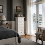 Bayview Tall Dresser White with cross-panel drawers in a refined Hampton-style bedroom.
