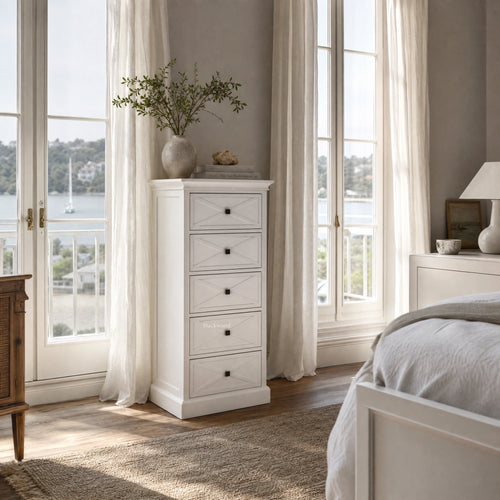 Bayview Tall Dresser - White with cross-panel drawers in a bright Hamptons-inspired bedroom.