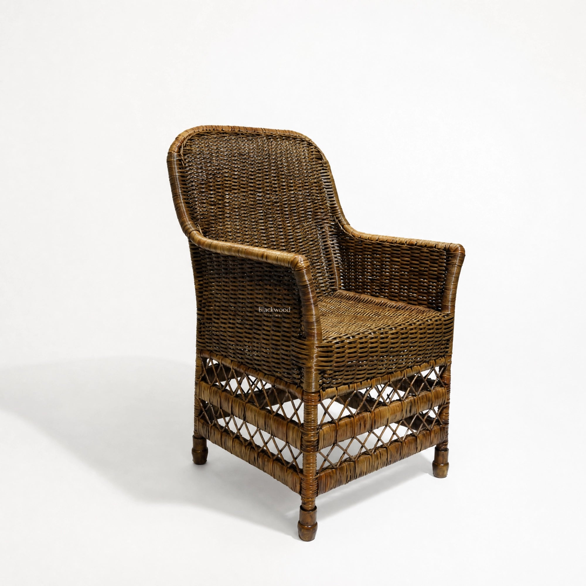 Malacca Accent Chair in woven natural rattan with curved arms and high back