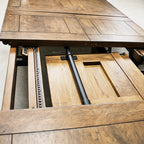 Renwick Extendable Dining Table 3.1 in solid mango wood with a paneled top and visible extension mechanism.