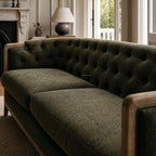Windsor Sofa - Cypress in dark textured fabric with chalk-wash oak frame, tufted back in a classic living room.