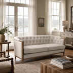 Windsor Sofa - Parchment with tufted light upholstery and chalk-wash oak frame in a bright, airy living room.