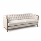 Windsor Sofa in parchment upholstery with tufted back and a chalk-wash oak frame
