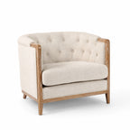 Windsor Lounge Chair in parchment with chalk-washed oak frame and tufted beige fabric.